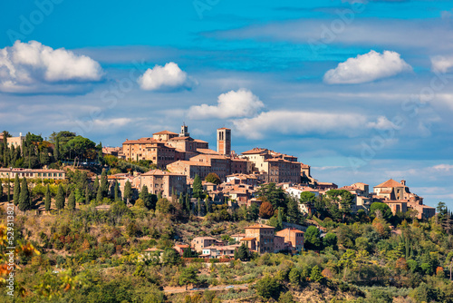Village of Montepulciano with wonderful architecture and houses. A beautiful old town in Tuscany, Italy. Aerial view of the medieval town of Montepulciano, Italy photo