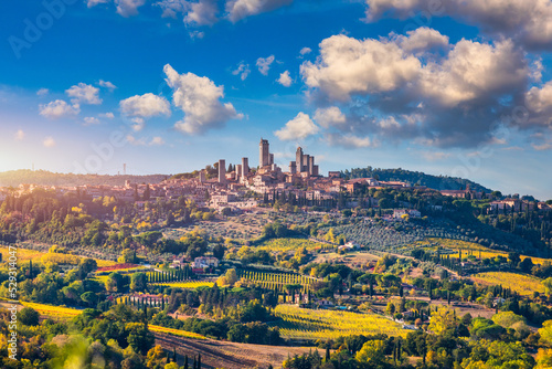 Town of San Gimignano, Tuscany, Italy with its famous medieval towers. Aerial view of the medieval village of San Gimignano, a Unesco World Heritage Site. Italy, Tuscany, Val d'Elsa. photo