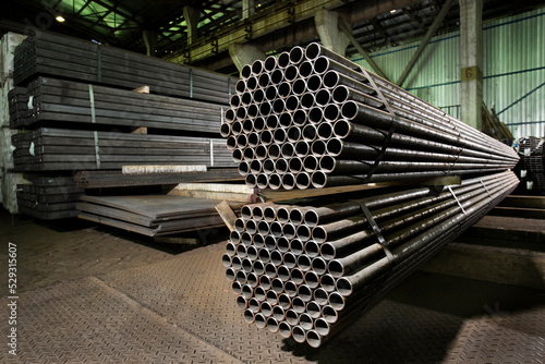 Metal pipes in factory photo