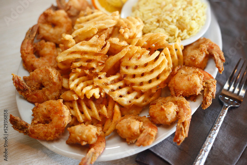 High angle view of fried food with rice served in plate on table