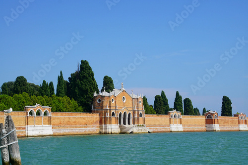 Brick walls of the cemetery island of San Michele, Venice, Italy photo