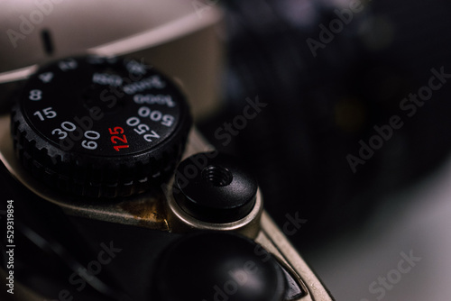 Vintage photography shutter speed gear with blurred space