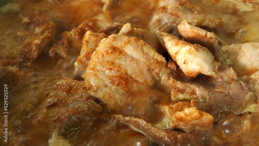 Frying chopped pork with chili paste in pan , Thai famous food Frying chopped pork with chili paste in pan , Thai famous food