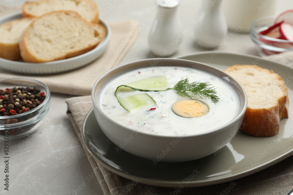 Delicious cold summer soup on light table Delicious cold summer soup on light table