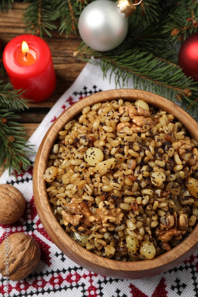 Traditional Christmas slavic dish kutia served on wooden table, above view