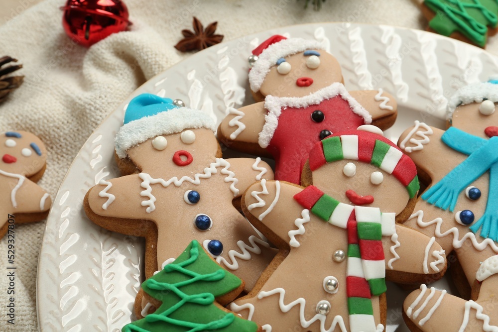 Delicious Christmas cookies and anise on fabric, closeup