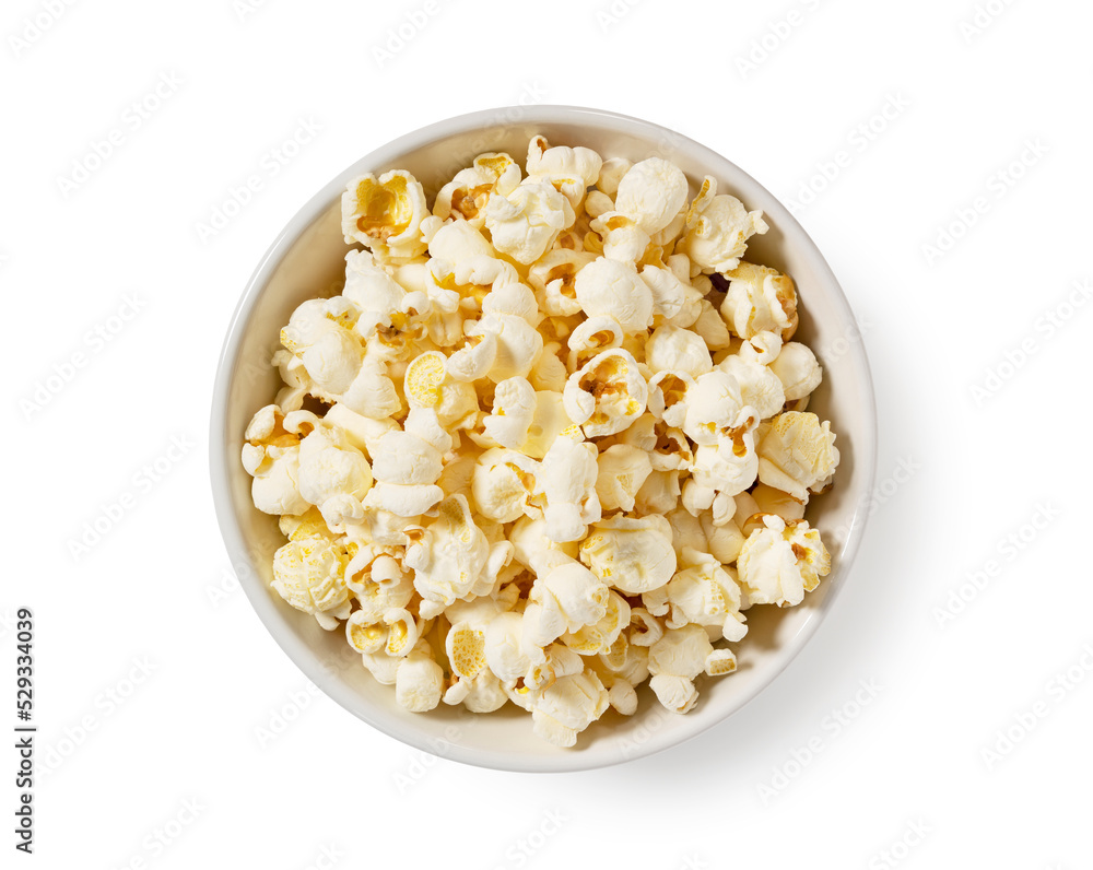 Popcorn in a white bowl placed on a white background.