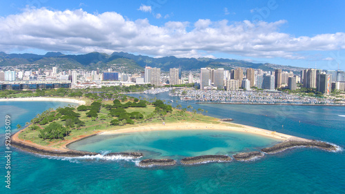 Aerial view of Magic Island in Ala Moana area with Waikiki and Honolulu in the background on the island of Oahu in Hawaii