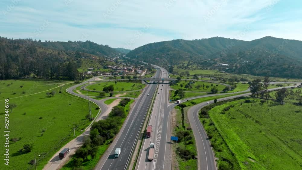 Aerial view dolly in of Route 68 via Santiago-Valparaiso, Chile. Road between lush mountains Aerial view dolly in of Route 68 via Santiago-Valparaiso, Chile. Road between lush mountains