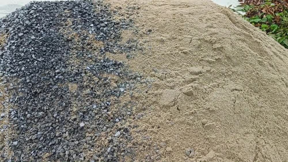 Pile of gravel or stone and sand for construction Pile of gravel or stone and sand for construction