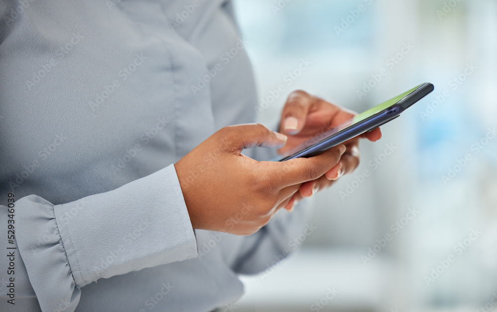Phone, hands and communication with a business woman networking with wifi technology in her office at work. Closeup of a female employee reading, typing or sending a text message on her mobile Phone, hands and communication with a business woman networking with wifi technology in her office at work. Closeup of a female employee reading, typing or sending a text message on her mobile