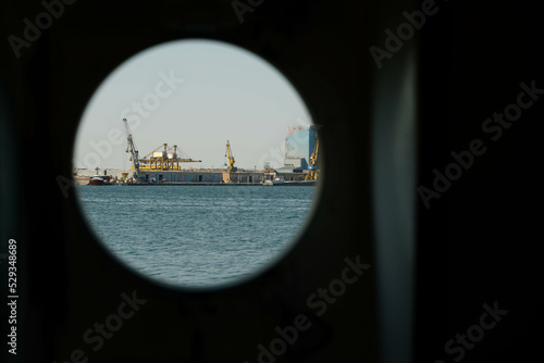 the port of Constanta. The port of Constanta seen through the window of a ship.