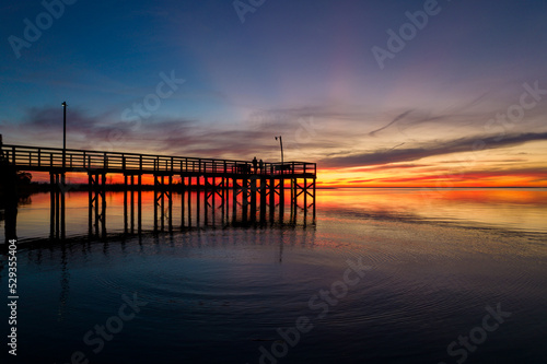 Pier on Mobile Bay at sunset in Daphne  Alabama