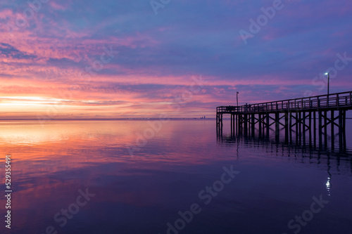 Pier on Mobile Bay at sunset in Daphne  Alabama