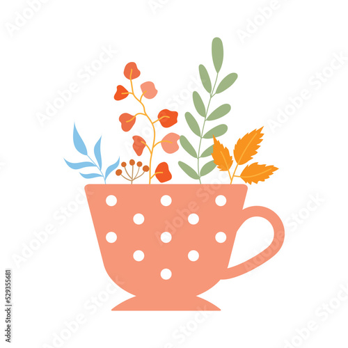 Colorful autumn leaves in a mug
