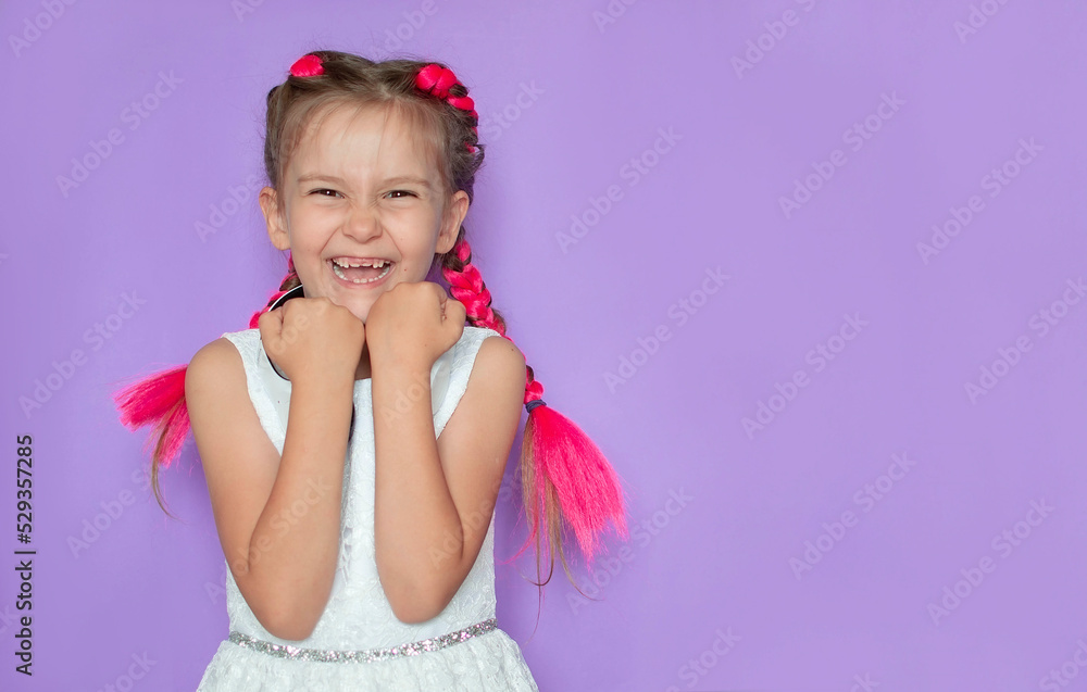 Excited, overjoyed, the girl feels happy, looking at the camera on a purple background, rejoicing in her success and victory, clenching her fists with joy. Positive emotions, feelings Excited, overjoyed, the girl feels happy, looking at the camera on a purple background, rejoicing in her success and victory, clenching her fists with joy. Positive emotions, feelings