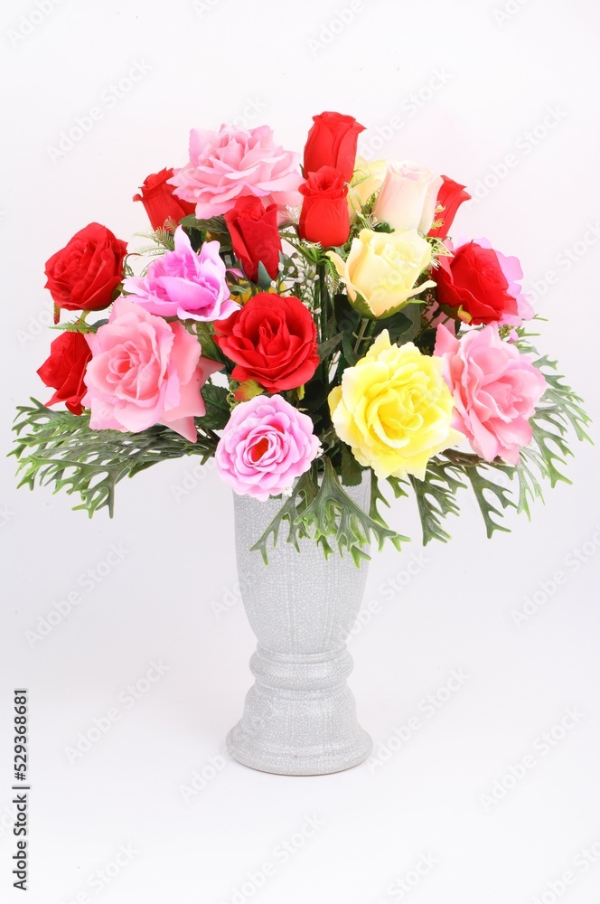 Decorative artificial roses flowers on white background Decorative artificial roses flowers on white background
