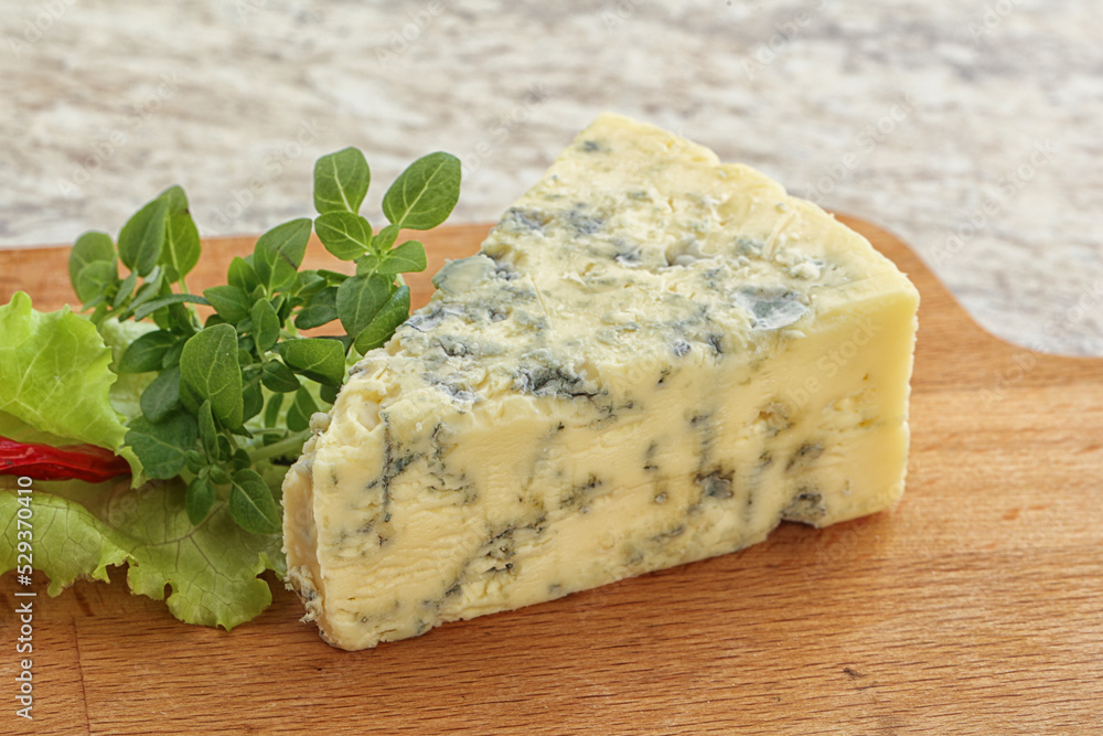 Blue cheese piece over board Blue cheese piece over board