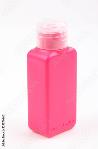 the bottle pink color packaging isolated on white background