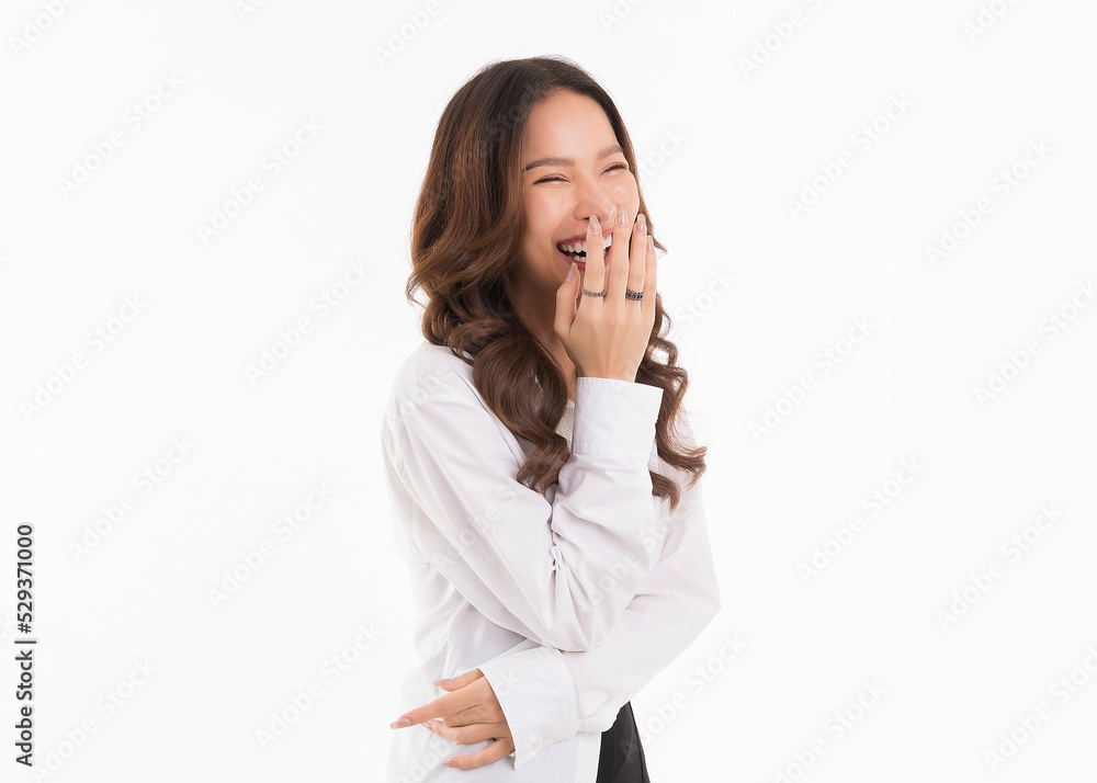 Asian woman with long hair wearing a white shirt standing with arms crossed and laughing. isolated on white background. Asian woman with long hair wearing a white shirt standing with arms crossed and laughing. isolated on white background.