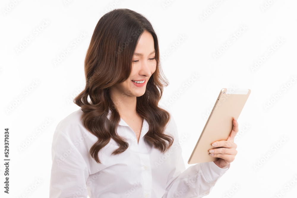 Asian woman long hair wearing a white shirt professional operating her tablet pc. isolated on white background. Asian woman long hair wearing a white shirt professional operating her tablet pc. isolated on white background.