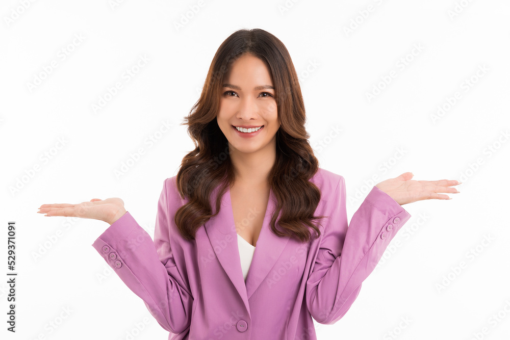 Smiling happy asian woman gesture with hand and showing balance isolated on white background. Smiling happy asian woman gesture with hand and showing balance isolated on white background.