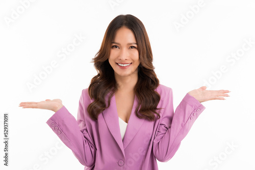 Smiling happy asian woman gesture with hand and showing balance isolated on white background.