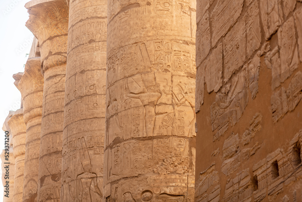 Different hieroglyphs on the walls and columns in the Karnak temple. Karnak temple is the largest complex in ancient Egypt.