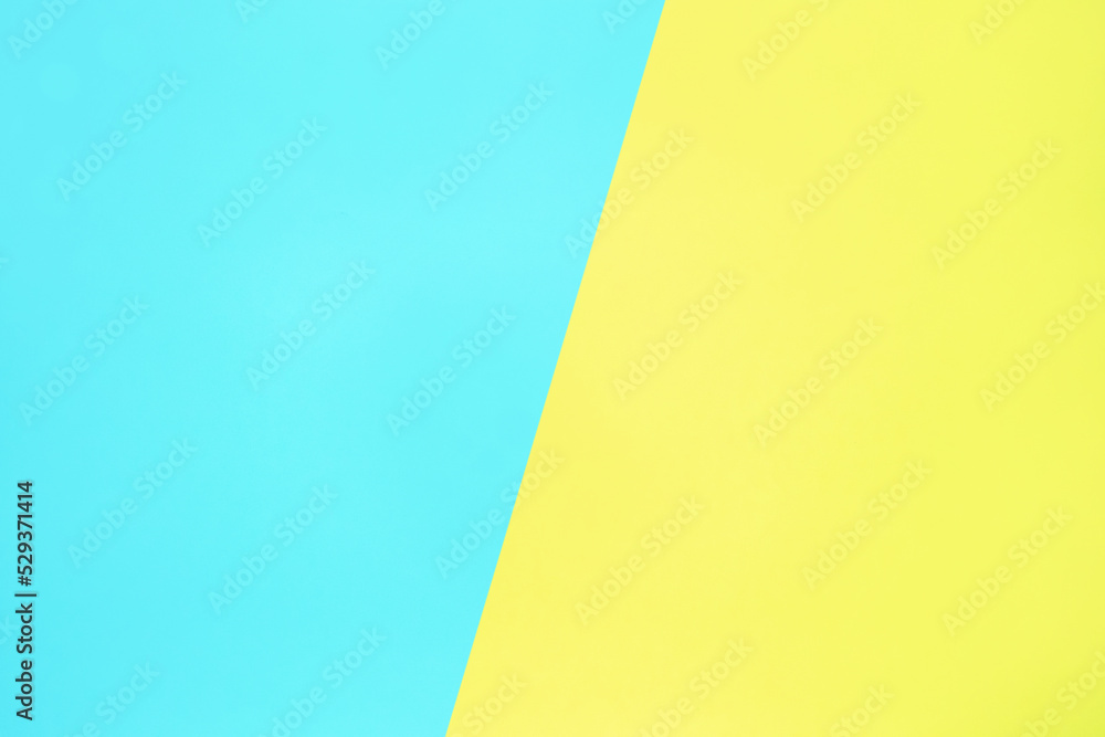 blue and yellow pastel color paper texture top view minimal flat lay background