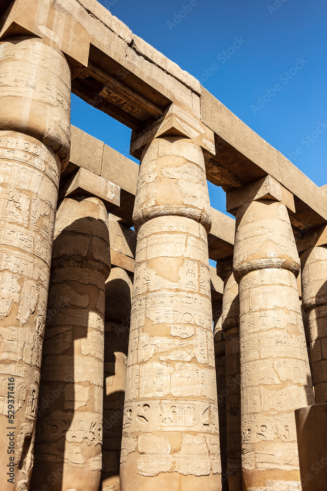 Different hieroglyphs on the walls and columns in the Karnak temple. Karnak temple is the largest complex in ancient Egypt. Different hieroglyphs on the walls and columns in the Karnak temple. Karnak temple is the largest complex in ancient Egypt.