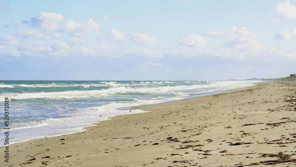 Establishing shot of beach in Cocoa Beach, Florida