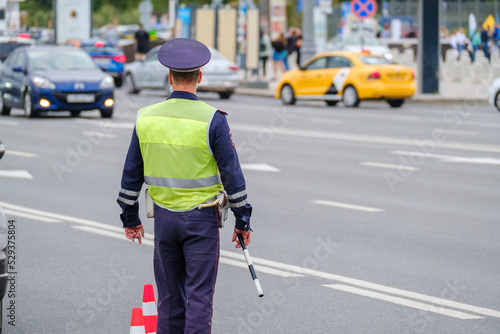 Traffic officer standing near road