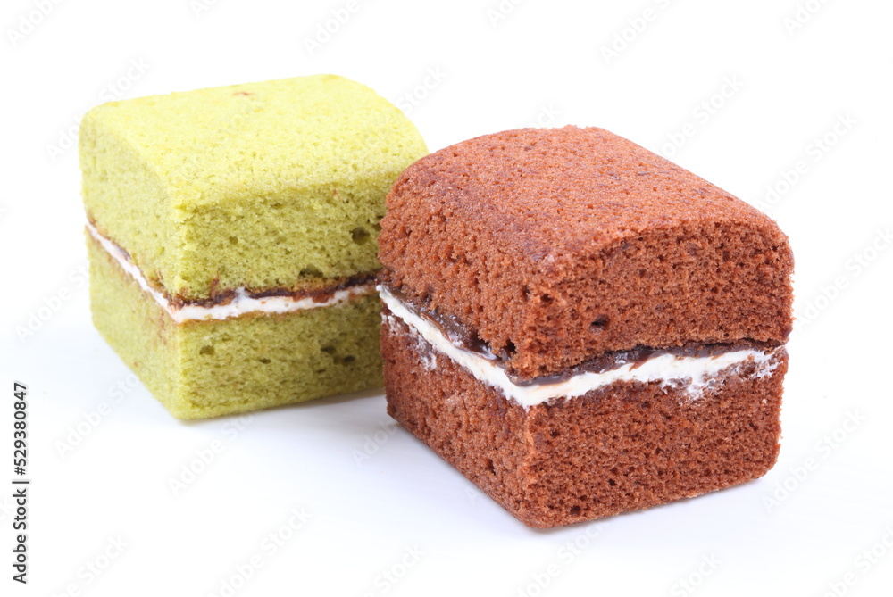 Brownie cheese cake and green tea cake on white background Brownie cheese cake and green tea cake on white background