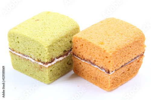 Brownie cheese cake and green tea cake on white background