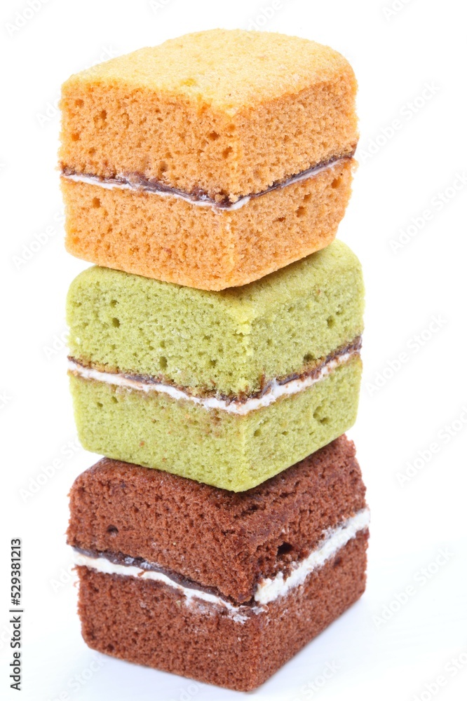 Brownie cheese cake and green tea cake on white background Brownie cheese cake and green tea cake on white background