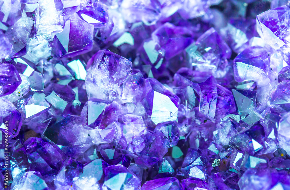 Blue Crystal Mineral Stone. Gems. Mineral crystals in the natural environment. Texture of precious and semiprecious stones. Seamless background with copy space colored shiny surface of precious stones Blue Crystal Mineral Stone. Gems. Mineral crystals in the natural environment. Texture of precious and semiprecious stones. Seamless background with copy space colored shiny surface of precious stones