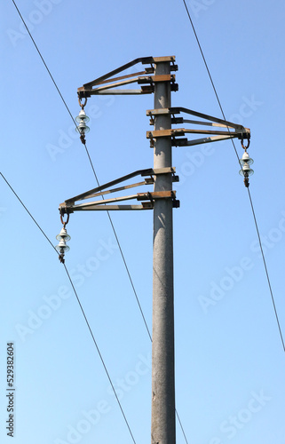 pole with the electric wires for the transport of electricity in High voltage