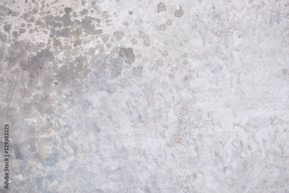 Light background of decorative plaster with abstract spots. Unusual texture of white or gray wall with beautiful patterns, creative surface background. Finishing coating for building cladding. Light background of decorative plaster with abstract spots. Unusual texture of white or gray wall with beautiful patterns, creative surface background. Finishing coating for building cladding.