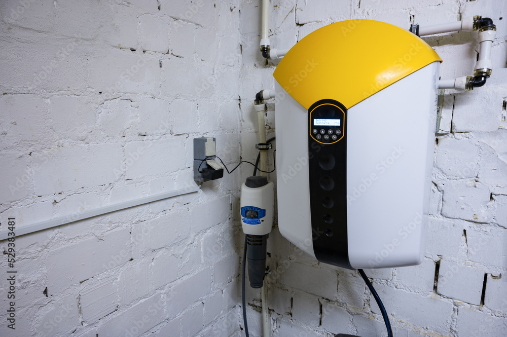 Water softening and descaler system for water treatment mounted to a