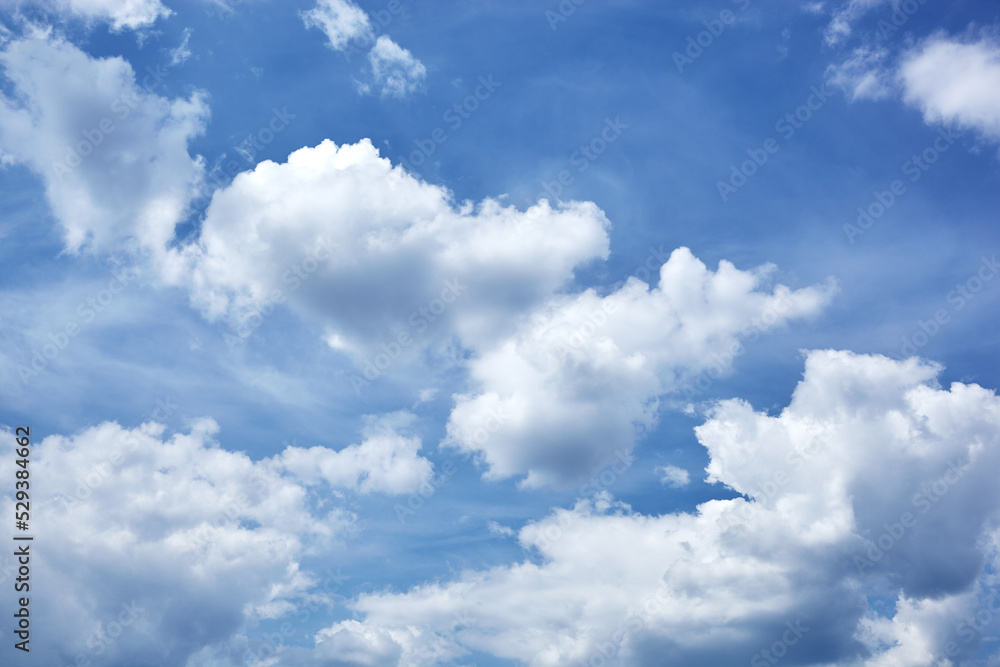 Abstract image of blurred sky. Blue sky background with cumulus clouds Abstract image of blurred sky. Blue sky background with cumulus clouds