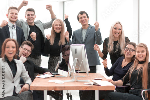 happy business team at the workplace in the office