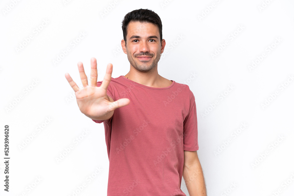 Young handsome man over isolated white background counting five with fingers Young handsome man over isolated white background counting five with fingers