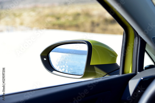 Side mirror on a passenger car