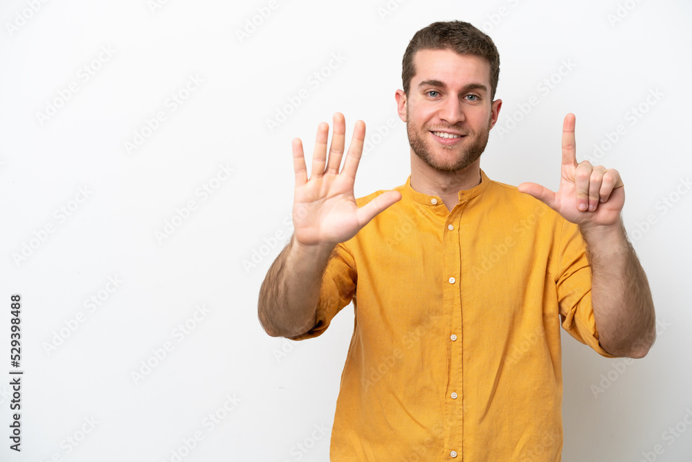 Young caucasian man isolated on white background counting seven with fingers Young caucasian man isolated on white background counting seven with fingers