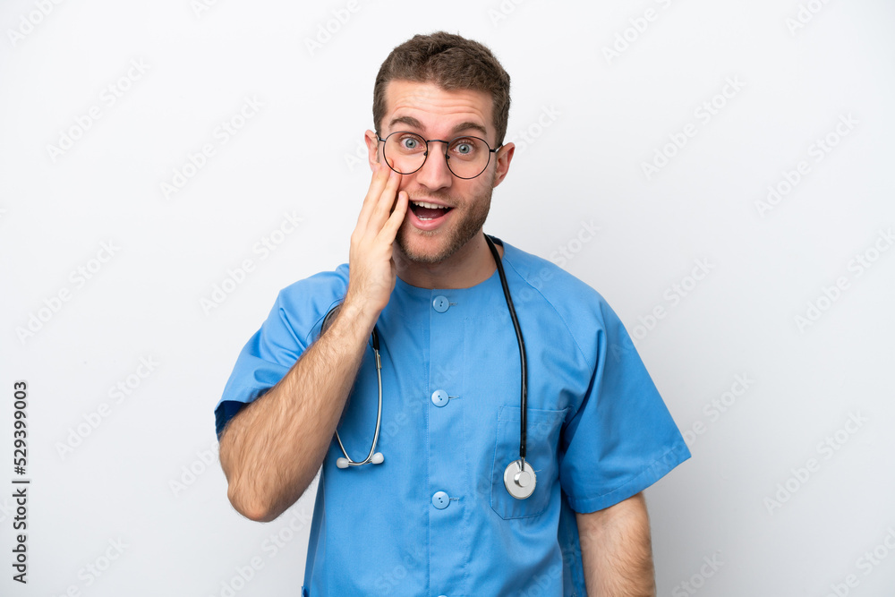 Young surgeon doctor caucasian man isolated on white background with surprise and shocked facial expression Young surgeon doctor caucasian man isolated on white background with surprise and shocked facial expression