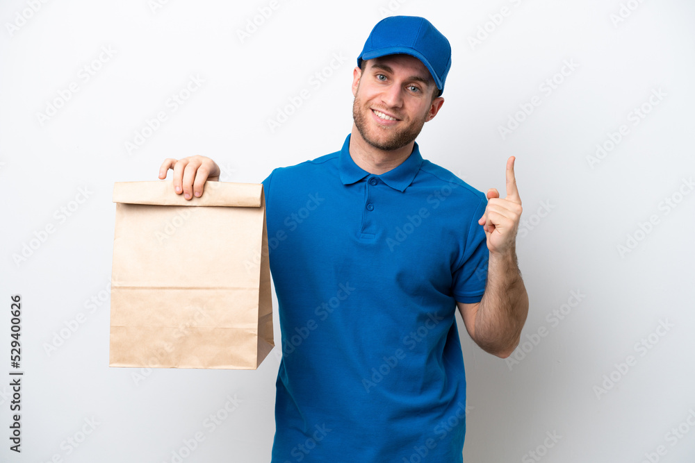 Delivery caucasian man isolated on white background showing and lifting a finger in sign of the best Delivery caucasian man isolated on white background showing and lifting a finger in sign of the best
