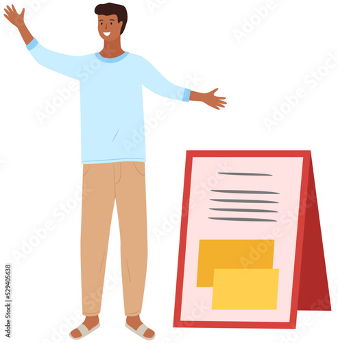 Indian village man in blue shirt and light trousers. Young smiling male character seller at market or street bazaar. Guy pointing somewhere with hand, talking to somebody, standing next to ad board