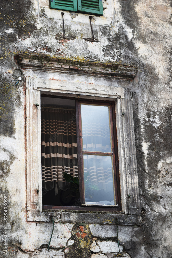 an old open window in an old house an old open window in an old house