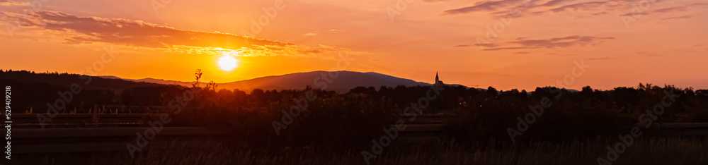 Obraz premium Beautiful sunrise view with two churches at Hengersberg, Bavaria, Germany