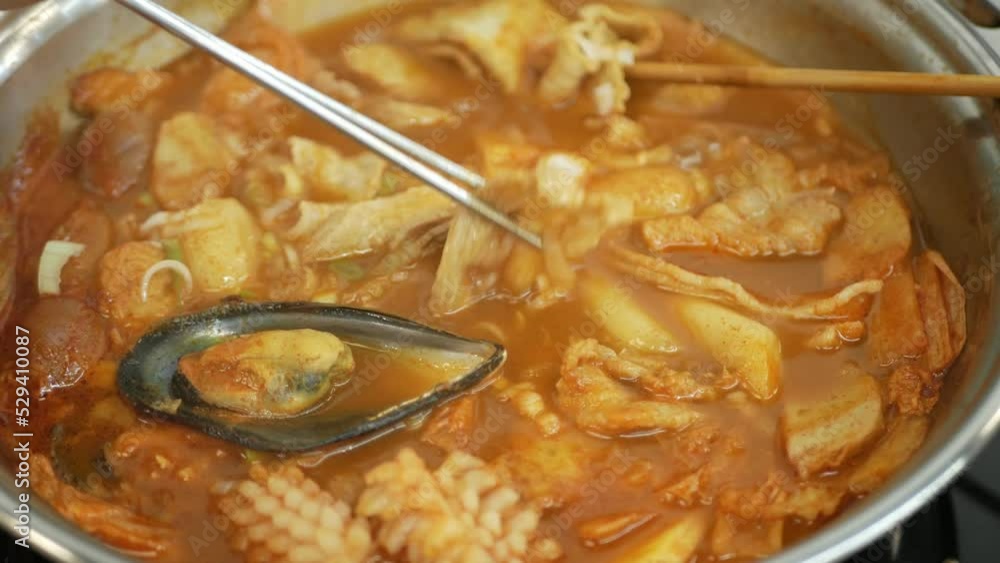 close up to the Korean Kimchi soup with squid,mussels,fish tofu and
